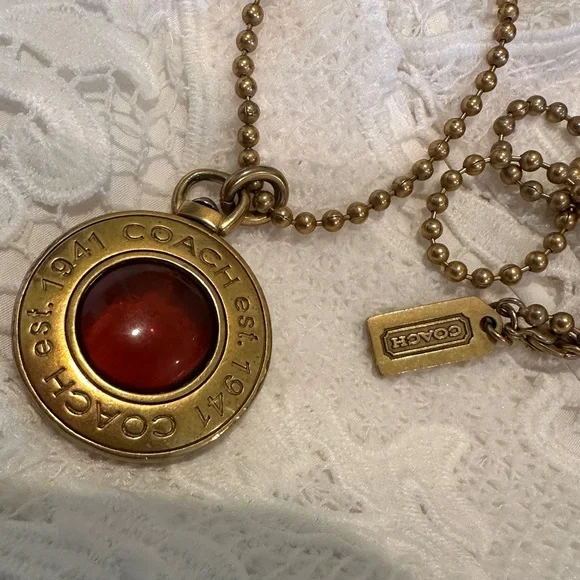 Coach Logo Pendant In Gold Tone with Amber Glass Center on Gold Tone Chain - Picture 10 of 16